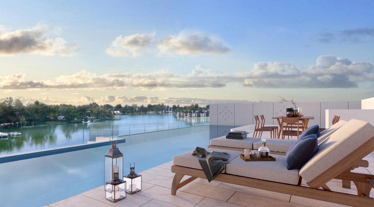 Angsana Oceanview Residences — rooftop lounge terrace at dusk